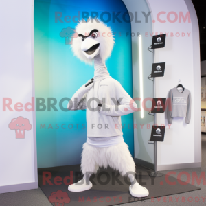 Bílá postava maskota Emu...