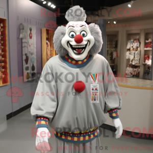 Grå klovnemaskotdraktfigur...