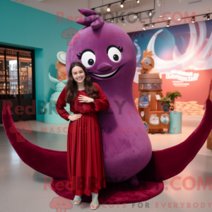 Maroon Narwhal mascot...
