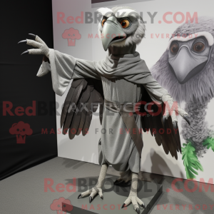 Grå Archaeopteryx maskot...