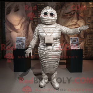 Silver Mummy mascot costume...