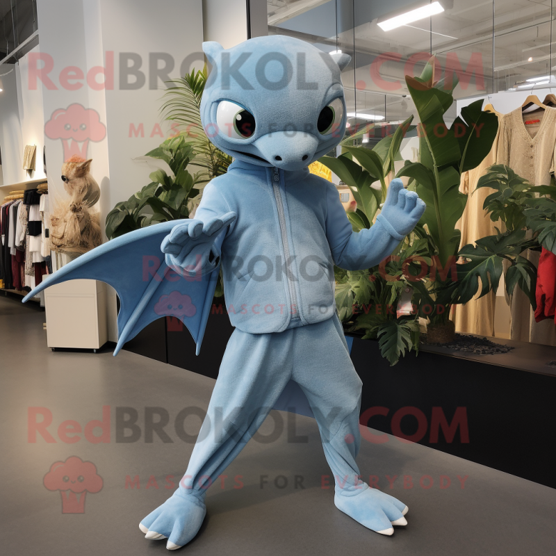 Sky Blue Pterodactyl mascot costume character dressed with a Joggers and Gloves