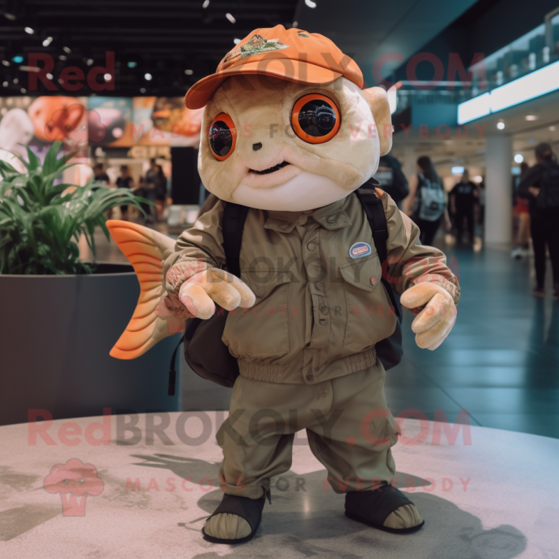 Tan Goldfish mascot costume character dressed with a Bomber Jacket and ...