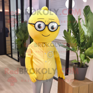 Lemon Yellow Apricot mascot costume character dressed with a Henley Tee and Eyeglasses