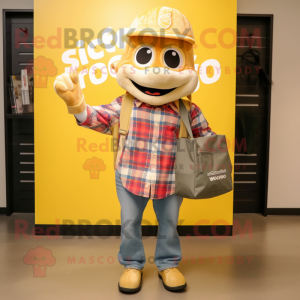 Gold Ceviche mascot costume character dressed with a Flannel Shirt and Tote bags