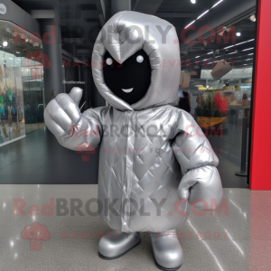 Silver Boxing Glove mascot costume character dressed with a Raincoat and Beanies