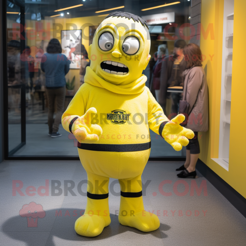 Lemon Yellow Frankenstein mascot costume character dressed with a Sweatshirt and Mittens