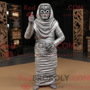 Silver Mummy mascot costume...