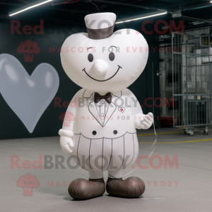 White Heart Shaped Balloons mascot costume character dressed with a Waistcoat and Shoe laces