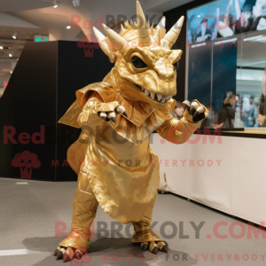 Guld Triceratops maskot...