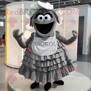 Gray Moussaka mascot costume character dressed with a Pleated Skirt and Rings