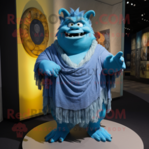 Blue Ogre mascot costume character dressed with a T-Shirt and Shawl pins