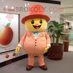 Peach Chocolates mascot costume character dressed with a Suit Pants and Hats