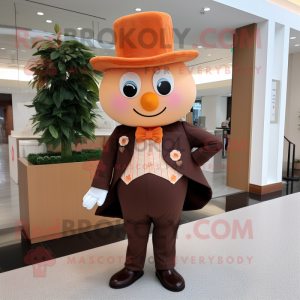 Peach Chocolates mascot costume character dressed with a Suit Pants and Hats