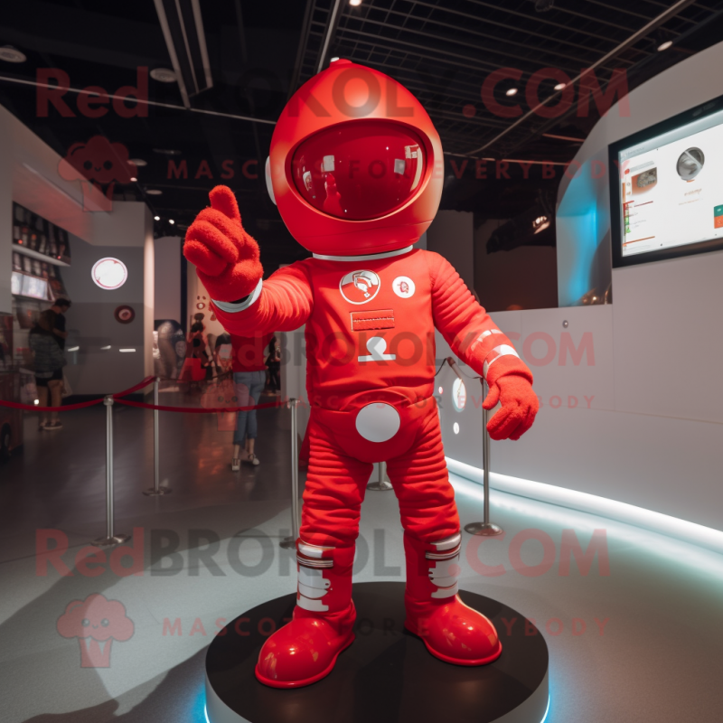 Red Astronaut mascot costume character dressed with a Flare Jeans and Anklets