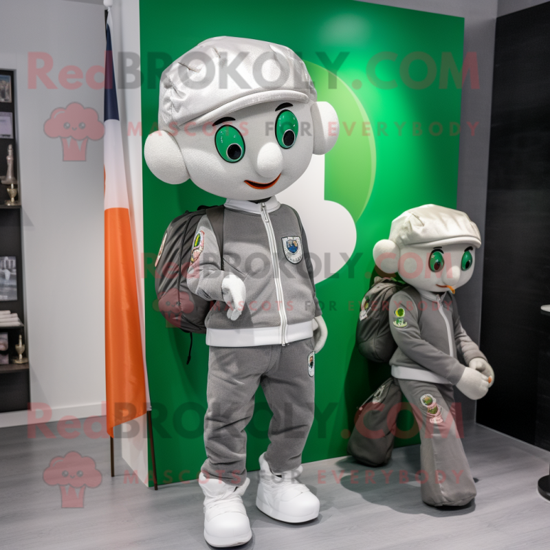 Silver Irish Flag mascot costume character dressed with a Long Sleeve Tee and Backpacks