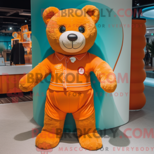 Maskotfigur af en orange...