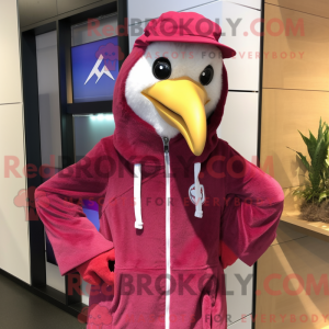 Maskotfigur af en magenta...