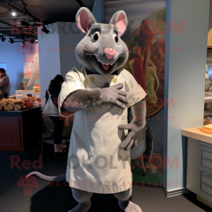 Gray Ratatouille mascot costume character dressed with a Graphic Tee and Earrings