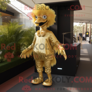 Maskotfigur af en guld-emu...