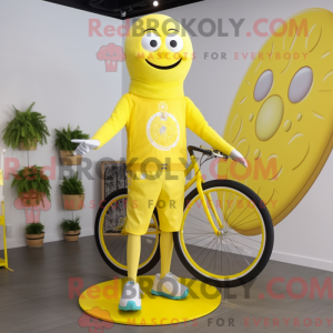 Maskotfigur af en citrongul...