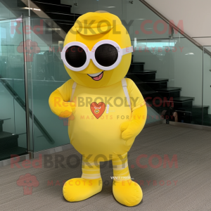 Lemon Yellow Heart mascot costume character dressed with a Jumpsuit and Reading glasses