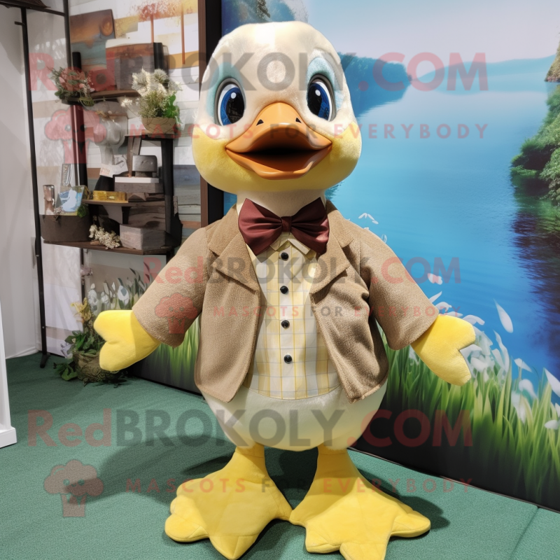 Beige Gosling mascot costume character dressed with a Romper and Bow ties