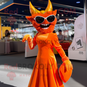 Orange Devil mascot costume character dressed with a Evening Gown and Sunglasses