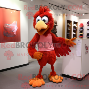 Maskotfigur af en rød harpy...