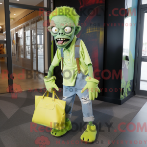 Maskotfigur af en limegrøn...