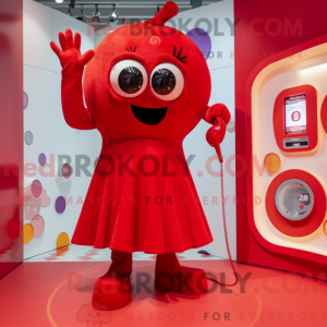 Maskot karakter af en rød...