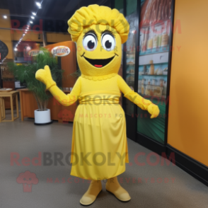 Yellow Paella mascot costume character dressed with a Empire Waist Dress and Shoe laces