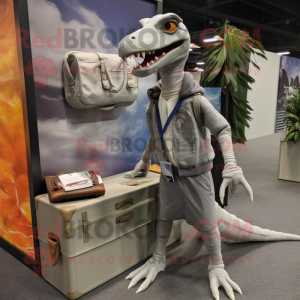 Gray Coelophysis mascot costume character dressed with a Sweatshirt and Briefcases