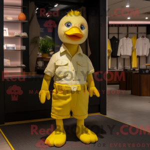 Maskotfigur af en citrongul...