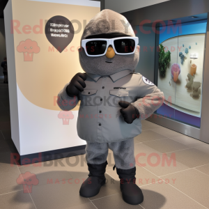 Gray Grenade mascot costume character dressed with a Polo Tee and Sunglasses