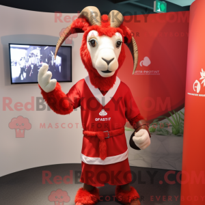 Maskot karakter af en rød...