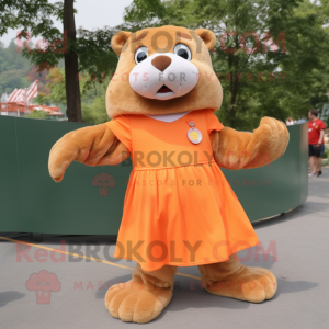 Orange Otter mascot costume character dressed with a Skirt and Shoe laces