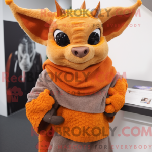 Maskotkarakter af en orange...