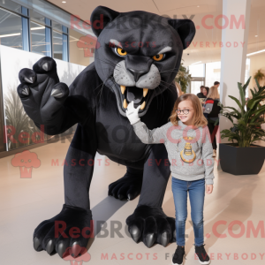 Maskot karakter af en sort...