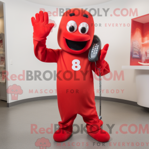 Maskot karakter af en rød...