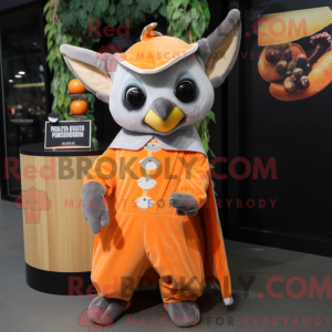 Maskotfigur af en orange...