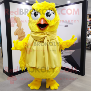 Lemon Yellow Fried Chicken mascot costume character dressed with a Corduroy Pants and Shawls