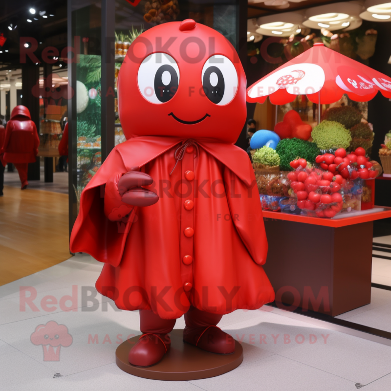 Red Chocolates mascot costume character dressed with a Raincoat and Shawls