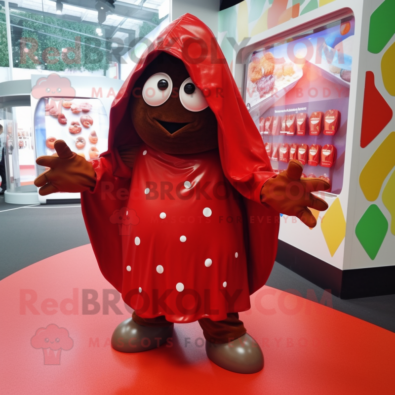 Red Chocolates mascot costume character dressed with a Raincoat and Shawls