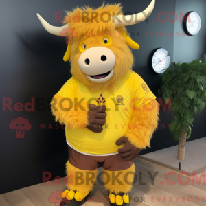 Maskotfigur af en gul Yak...