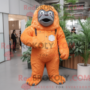 Maskotfigur af en orange...