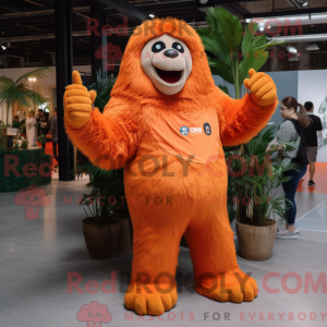 Maskotfigur af en orange...