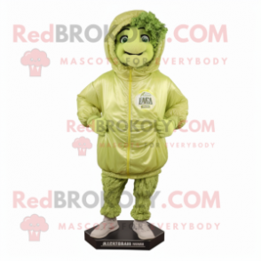 Lime Green Caesar Salad mascot costume character dressed with a Windbreaker and Foot pads