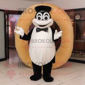 Cream Bagels mascot costume character dressed with a Tuxedo and Gloves