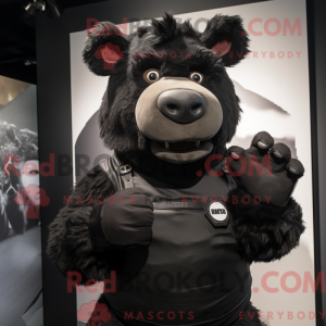 Maskot postava černé...